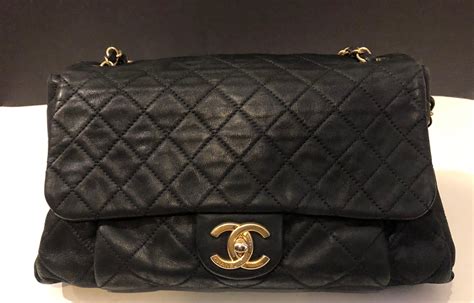 the chanel quilted bag.|Chanel quilted reissue shoulder bag.